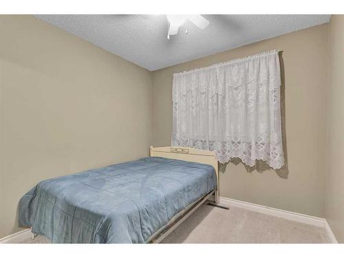 2442 Elmwood Drive Se, Calgary, AB - Indoor Photo Showing Bedroom