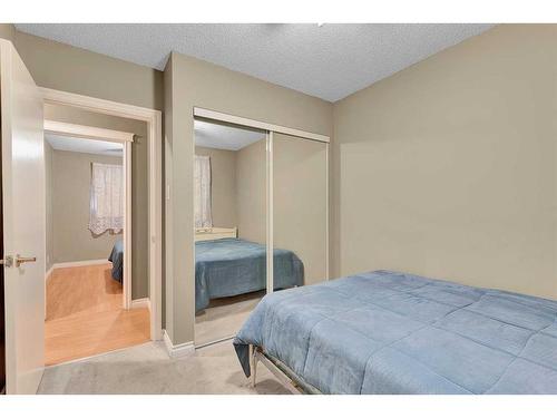 2442 Elmwood Drive Se, Calgary, AB - Indoor Photo Showing Bedroom