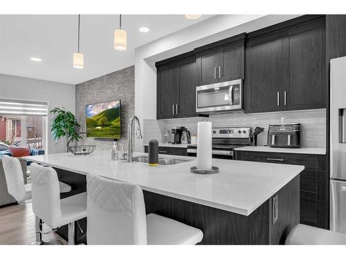 348 Chinook Gate Close Sw, Airdrie, AB - Indoor Photo Showing Kitchen With Stainless Steel Kitchen With Upgraded Kitchen