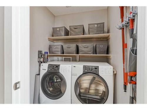 2486 Ravenswood View Se, Airdrie, AB - Indoor Photo Showing Laundry Room