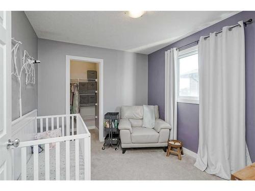 2486 Ravenswood View Se, Airdrie, AB - Indoor Photo Showing Bedroom