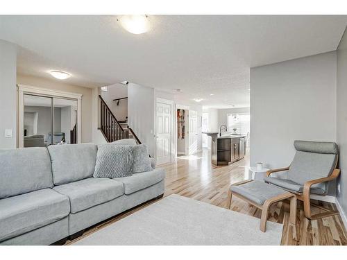 2486 Ravenswood View Se, Airdrie, AB - Indoor Photo Showing Living Room