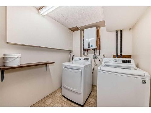 231 Shawglen Road Sw, Calgary, AB - Indoor Photo Showing Laundry Room