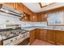 231 Shawglen Road Sw, Calgary, AB  - Indoor Photo Showing Kitchen 