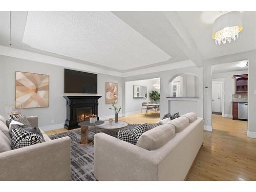 2131 Westmount Road Nw, Calgary, AB - Indoor Photo Showing Living Room With Fireplace