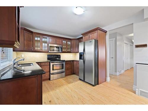 2131 Westmount Road Nw, Calgary, AB - Indoor Photo Showing Kitchen With Stainless Steel Kitchen