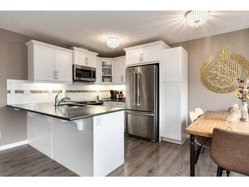 196 Windford Park Sw, Airdrie, AB - Indoor Photo Showing Kitchen With Stainless Steel Kitchen With Double Sink