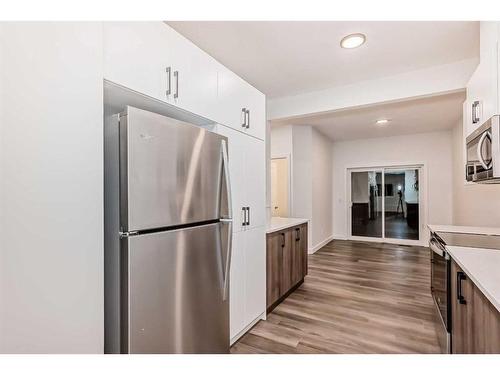 76 Tuscany Summit Square Nw, Calgary, AB - Indoor Photo Showing Kitchen