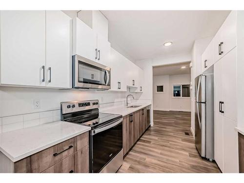 76 Tuscany Summit Square Nw, Calgary, AB - Indoor Photo Showing Kitchen With Stainless Steel Kitchen With Upgraded Kitchen