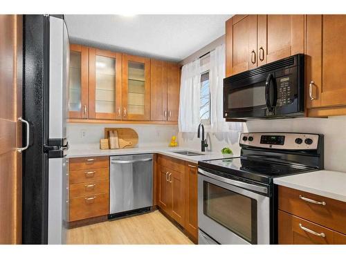 1216 Allen Street Se, Airdrie, AB - Indoor Photo Showing Kitchen