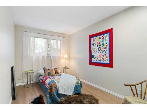 1216 Allen Street Se, Airdrie, AB - Indoor Photo Showing Bedroom