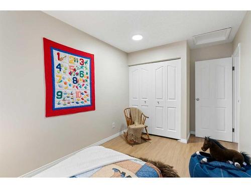 1216 Allen Street Se, Airdrie, AB - Indoor Photo Showing Bedroom