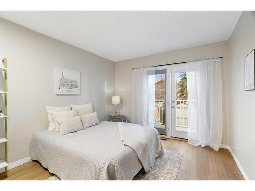 1216 Allen Street Se, Airdrie, AB - Indoor Photo Showing Bedroom