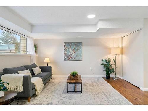 1216 Allen Street Se, Airdrie, AB - Indoor Photo Showing Living Room