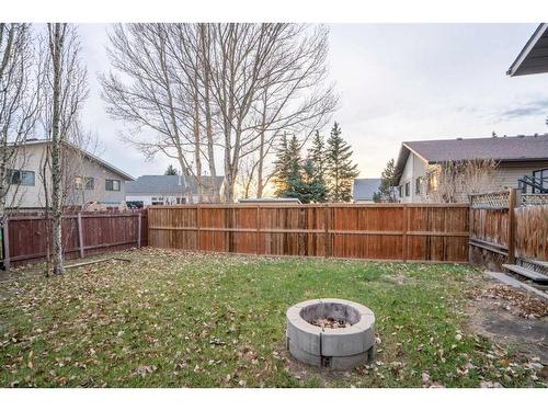 1216 Allen Street Se, Airdrie, AB - Outdoor With Backyard