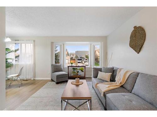 1216 Allen Street Se, Airdrie, AB - Indoor Photo Showing Living Room