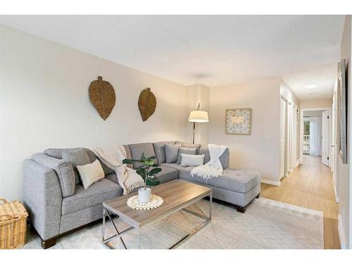 1216 Allen Street Se, Airdrie, AB - Indoor Photo Showing Living Room