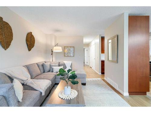 1216 Allen Street Se, Airdrie, AB - Indoor Photo Showing Living Room