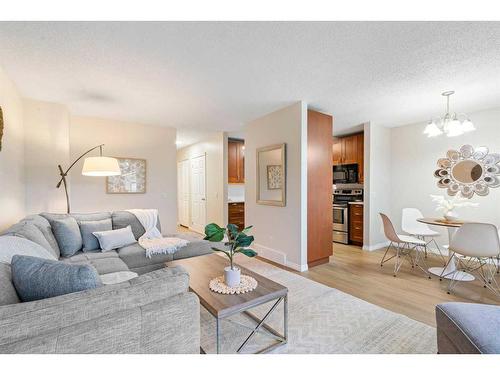 1216 Allen Street Se, Airdrie, AB - Indoor Photo Showing Living Room