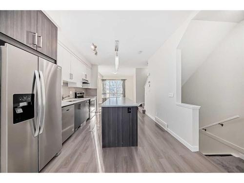 940 Sherwood Boulevard Nw, Calgary, AB - Indoor Photo Showing Kitchen With Stainless Steel Kitchen With Upgraded Kitchen