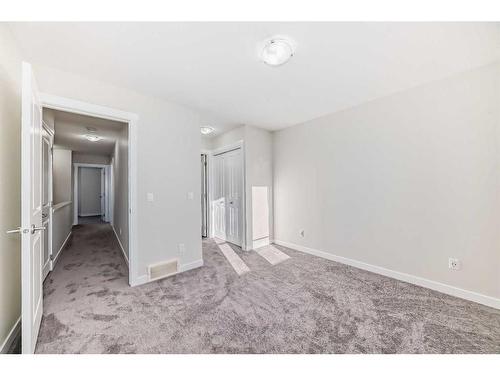 940 Sherwood Boulevard Nw, Calgary, AB - Indoor Photo Showing Other Room