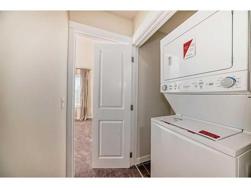 940 Sherwood Boulevard Nw, Calgary, AB - Indoor Photo Showing Laundry Room