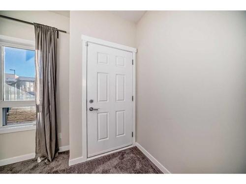 940 Sherwood Boulevard Nw, Calgary, AB - Indoor Photo Showing Other Room