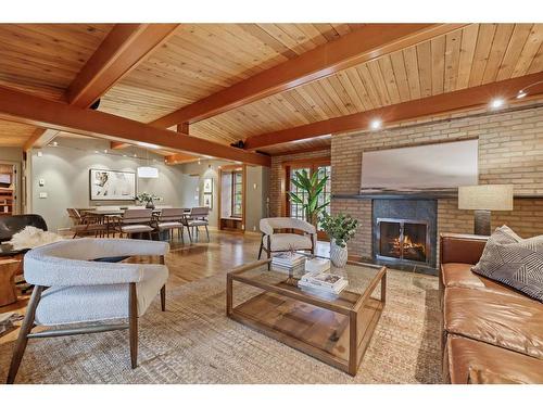 4307 Anne Avenue Sw, Calgary, AB - Indoor Photo Showing Living Room With Fireplace