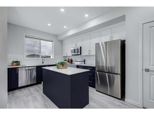 152 Edith Place Nw, Calgary, AB - Indoor Photo Showing Kitchen With Stainless Steel Kitchen With Upgraded Kitchen