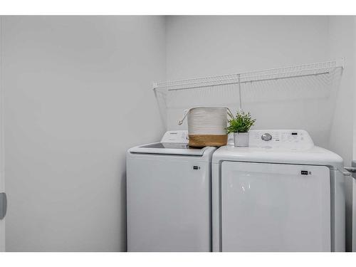 152 Edith Place Nw, Calgary, AB - Indoor Photo Showing Laundry Room