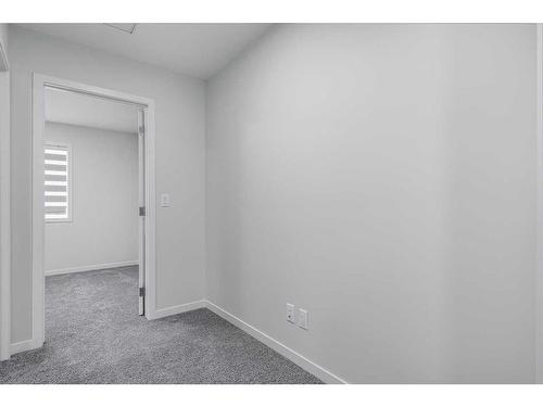 152 Edith Place Nw, Calgary, AB - Indoor Photo Showing Other Room