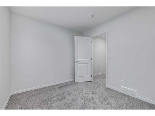 152 Edith Place Nw, Calgary, AB - Indoor Photo Showing Other Room