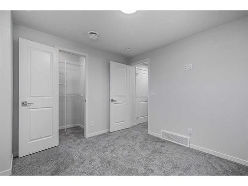 152 Edith Place Nw, Calgary, AB - Indoor Photo Showing Other Room