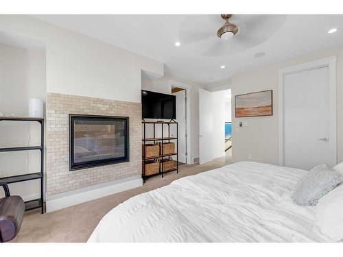 2635 29 Street Sw, Calgary, AB - Indoor Photo Showing Bedroom With Fireplace