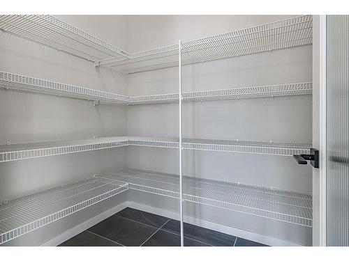 532 Belmont Heath Sw, Calgary, AB - Indoor With Storage