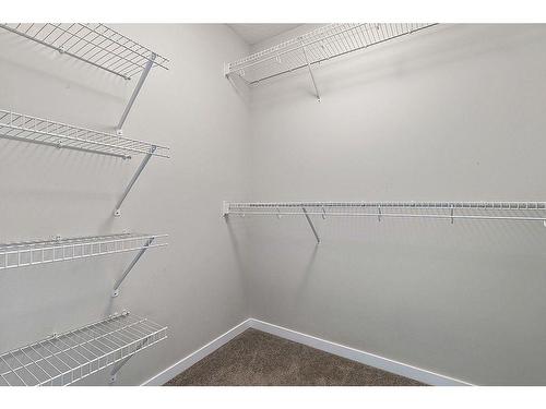 532 Belmont Heath Sw, Calgary, AB - Indoor With Storage