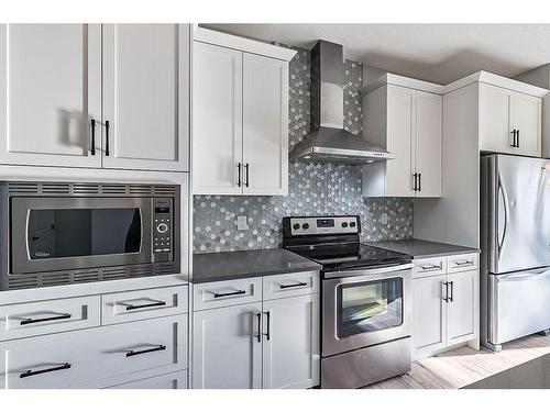 532 Belmont Heath Sw, Calgary, AB - Indoor Photo Showing Kitchen With Stainless Steel Kitchen With Upgraded Kitchen