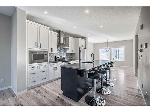 532 Belmont Heath Sw, Calgary, AB - Indoor Photo Showing Kitchen With Upgraded Kitchen