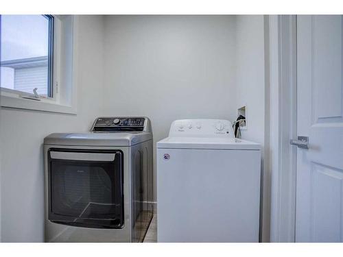 3847 Catalina Boulevard Ne, Calgary, AB - Indoor Photo Showing Laundry Room