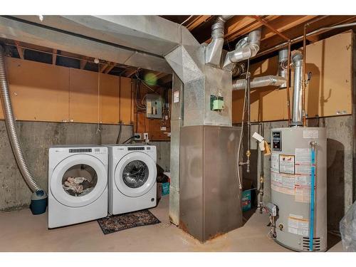 189 Templehill Drive Ne, Calgary, AB - Indoor Photo Showing Laundry Room