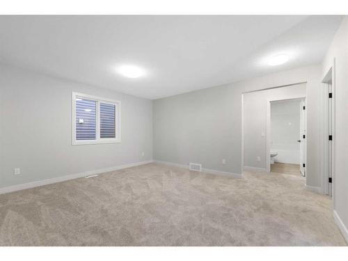 23 Key Cove, Airdrie, AB - Indoor Photo Showing Other Room