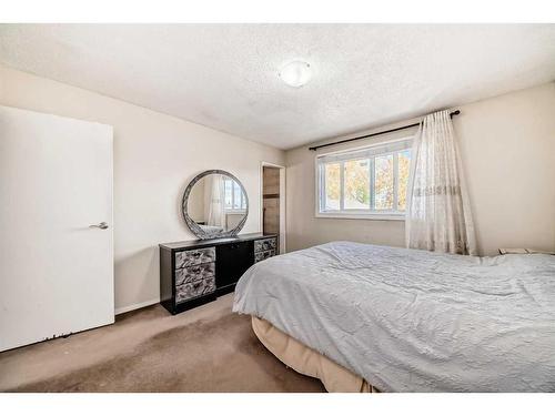 16 Madigan Court Ne, Calgary, AB - Indoor Photo Showing Bedroom