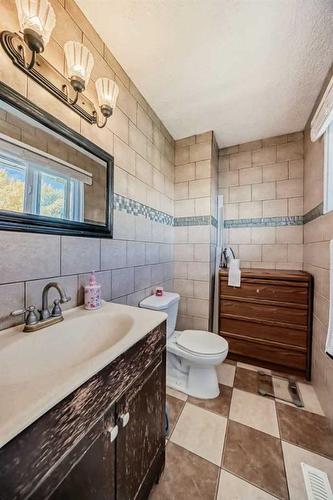 16 Madigan Court Ne, Calgary, AB - Indoor Photo Showing Bathroom