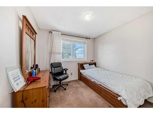 16 Madigan Court Ne, Calgary, AB - Indoor Photo Showing Bedroom