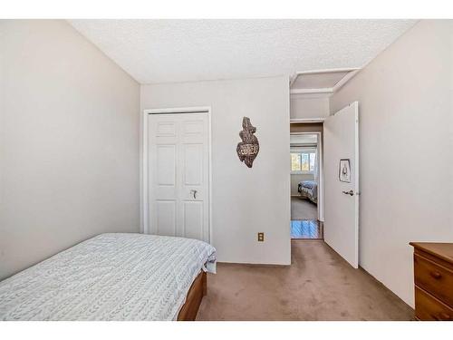 16 Madigan Court Ne, Calgary, AB - Indoor Photo Showing Bedroom