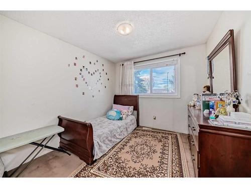 16 Madigan Court Ne, Calgary, AB - Indoor Photo Showing Bedroom