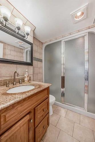 16 Madigan Court Ne, Calgary, AB - Indoor Photo Showing Bathroom