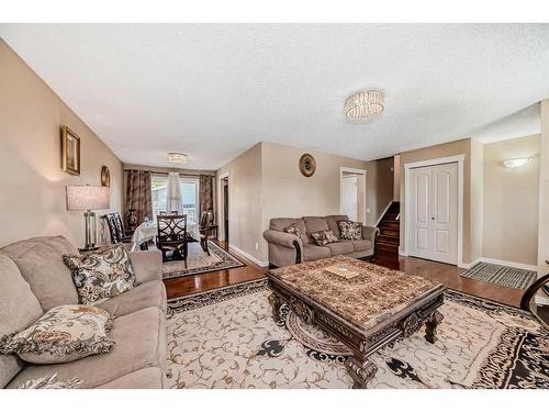 16 Madigan Court Ne, Calgary, AB - Indoor Photo Showing Living Room