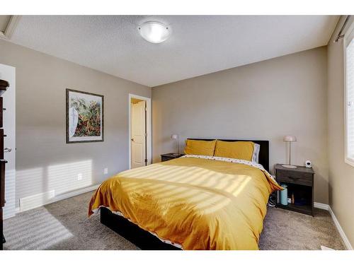 1587 Windstone Road Sw, Airdrie, AB - Indoor Photo Showing Bedroom