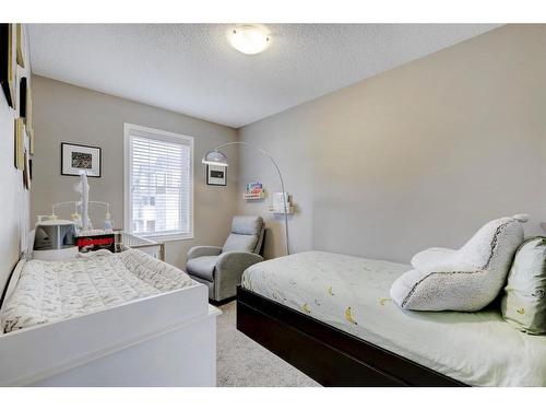 1587 Windstone Road Sw, Airdrie, AB - Indoor Photo Showing Bedroom